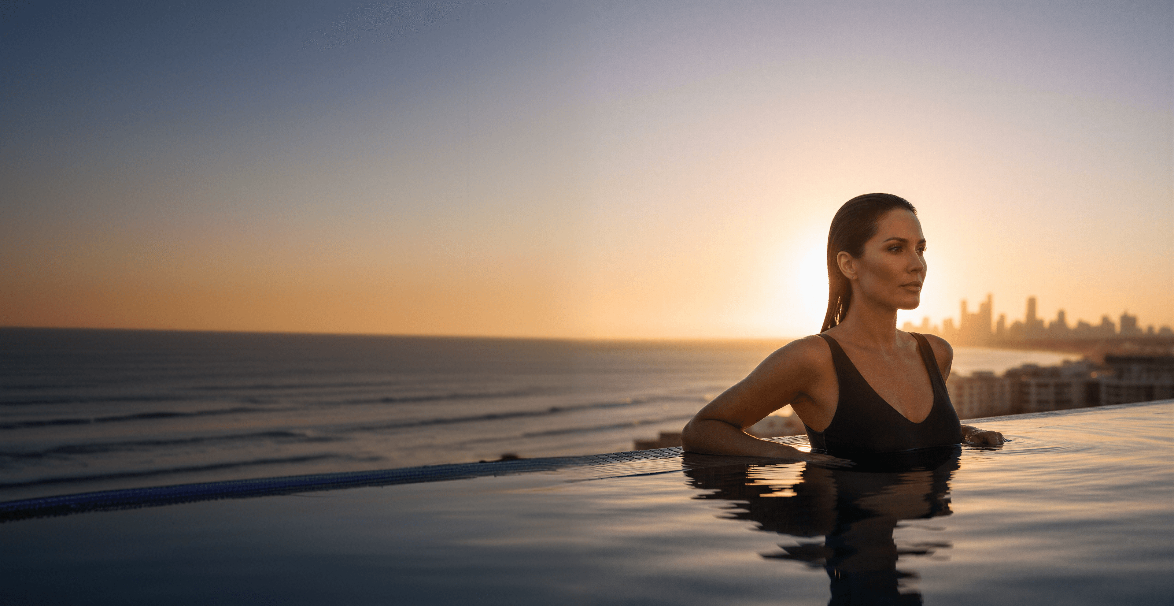 Woman relaxing during a scenic sunset experience
